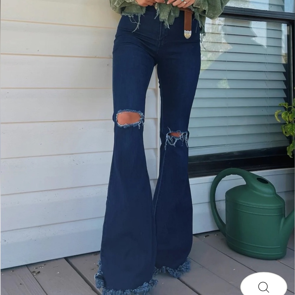 Dark Blue Flare Jeans with Distressed Details